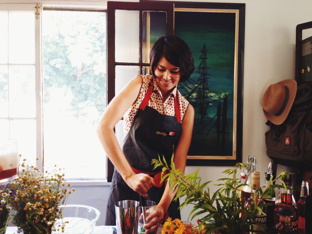 Emily Han (photo credit Laure Joliet) making delicious drinks for her book "Wild Drinks and Cocktails" - see the review on pixiespocket.com